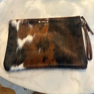 W & G cowhide clutch.